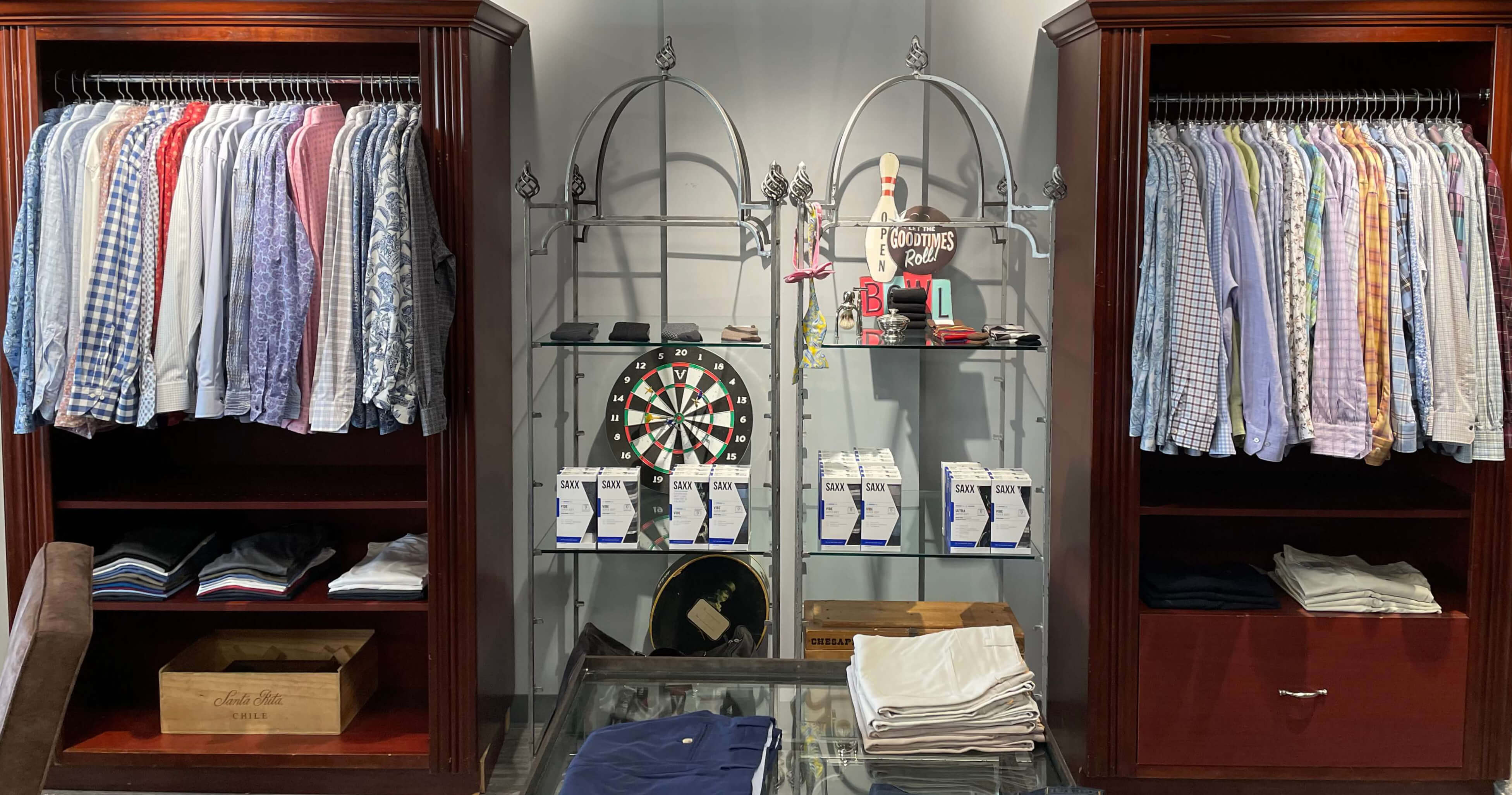 Collection of sports shirts display in JwR's store.